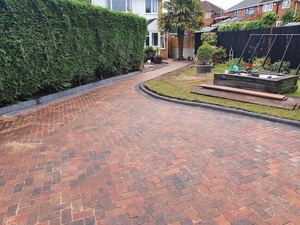 Block-paved brindle driveway with kerb edging